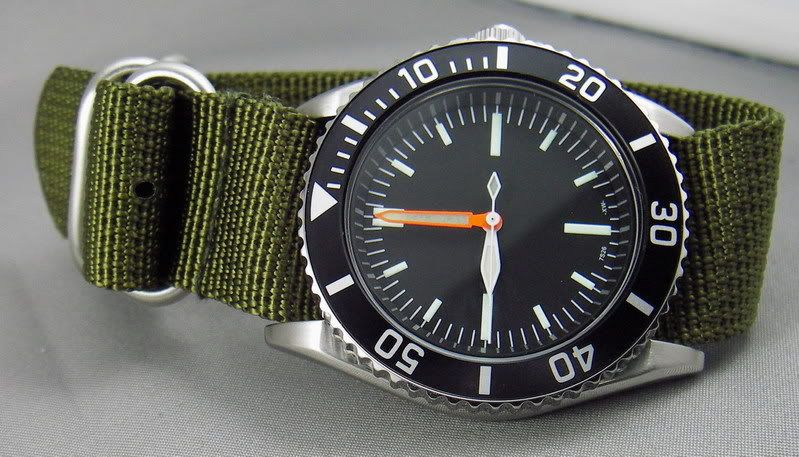 http://i49.photobucket.com/albums/f272/noahfuller/Seiko%20modding/IMGP3107.jpg?t=1208697372