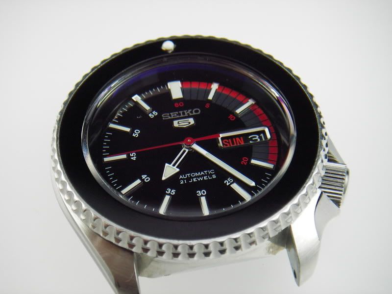 http://i49.photobucket.com/albums/f272/noahfuller/Seiko%20modding/IMGP3384.jpg?t=1211942307