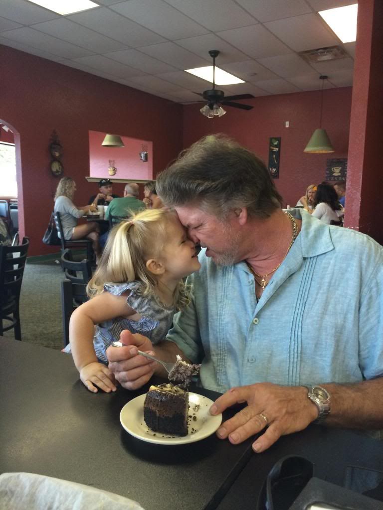 mackenzie eating cake with grandpa